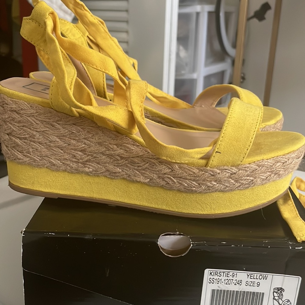 Yellow espadrilles tie up